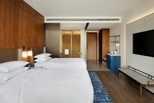Imagen de la habitación del Hotel Sheraton Xuzhou. Foto 18