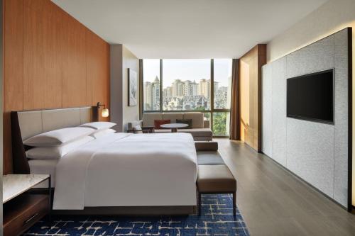 Imagen de la habitación del Hotel Sheraton Xuzhou. Foto 19