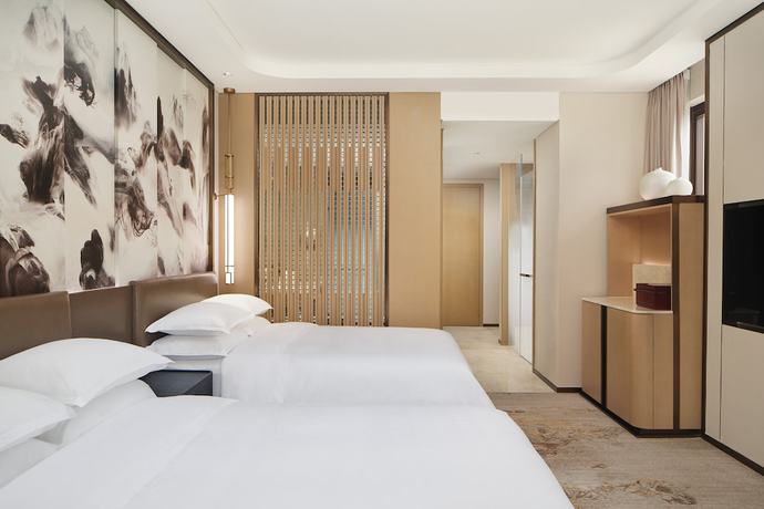 Imagen de la habitación del Hotel Sheraton Yunfu Xinxing. Foto 18