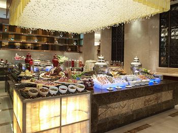 Imagen del bar/restaurante del Hotel Sheraton Zhenjiang Hotel. Foto 9