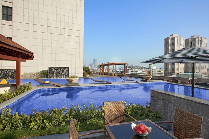 Imagen de la piscina del Hotel Sheraton Zhongshan. Foto 16
