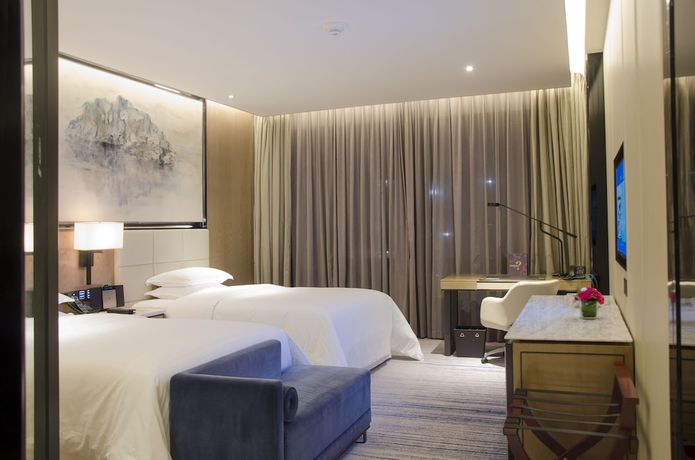 Imagen de la habitación del Hotel Sheraton Zhuhai. Foto 11