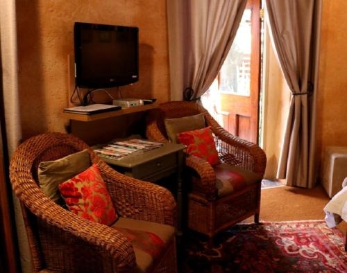 Imagen de la habitación del Hotel Sherewood Lodge. Foto 6