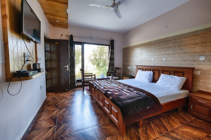 Imagen de la habitación del Hotel Sherpa Eco Resort. Foto 8