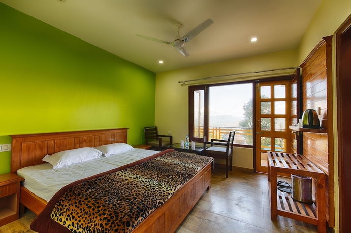 Imagen de la habitación del Hotel Sherpa Eco Resort. Foto 10