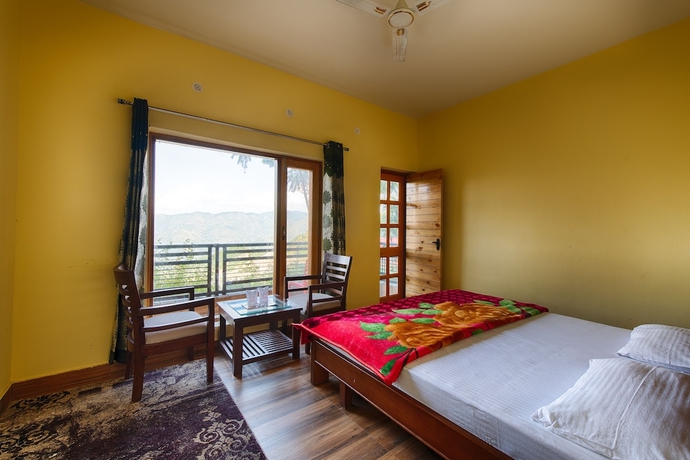 Imagen de la habitación del Hotel Sherpa Eco Resort. Foto 11