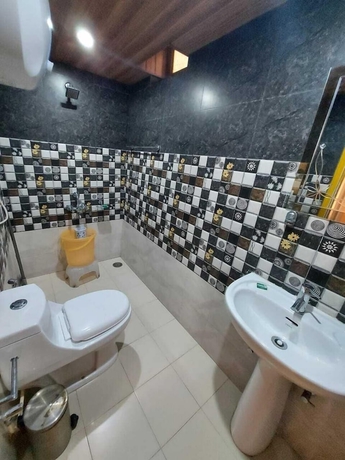 Imagen de la habitación del Hotel Sherpa Eco Resort. Foto 13