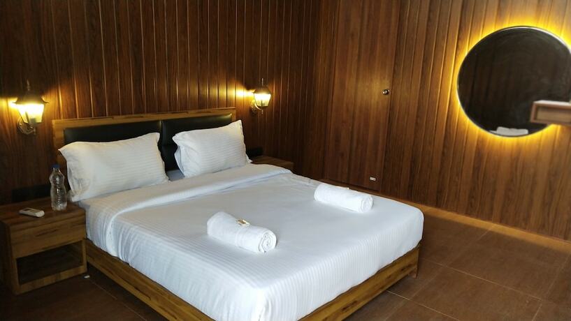 Imagen de la habitación del Hotel Shetty Farms. Foto 18