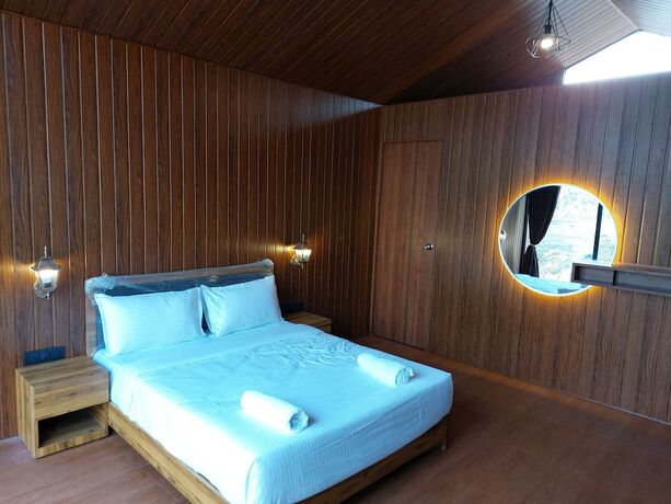 Imagen de la habitación del Hotel Shetty Farms. Foto 20