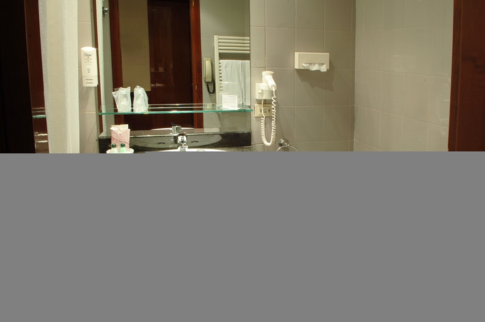 Imagen de la habitación del Hotel Shg Catullo. Foto 5