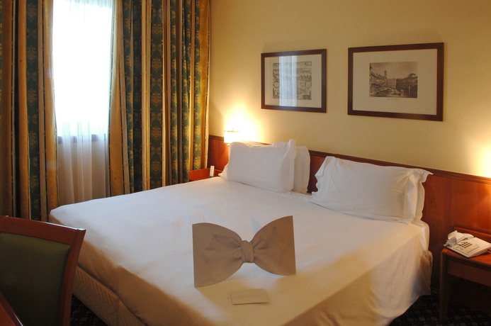 Imagen de la habitación del Hotel Shg Catullo. Foto 9