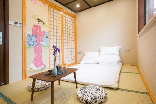 Imagen de la habitación del Hotel Shi Fang. Foto 6