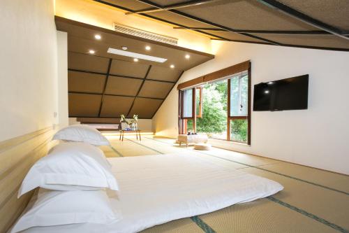 Imagen de la habitación del Hotel Shi Fang. Foto 9