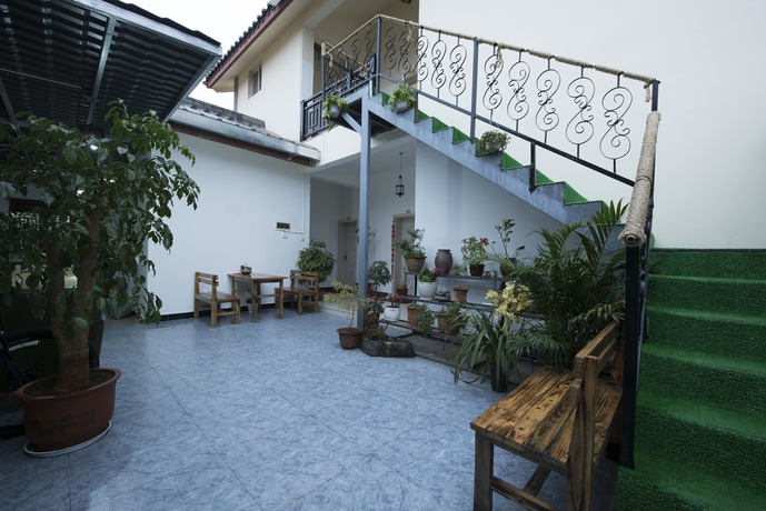 Imagen de los exteriores del Hotel Shi Lin Family Folk Inn. Foto 17