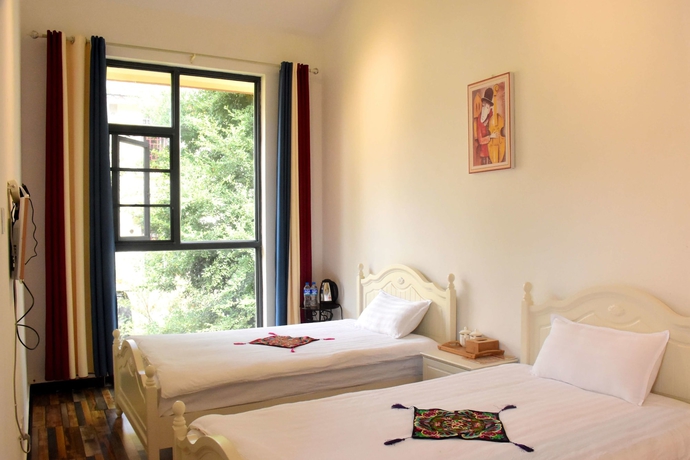 Imagen de la habitación del Hotel Shi Lin Family Folk Inn. Foto 12