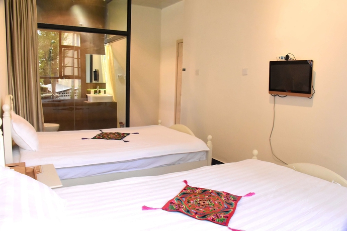 Imagen de la habitación del Hotel Shi Lin Family Folk Inn. Foto 14