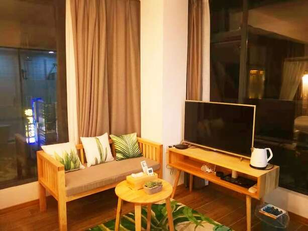 Imagen general del Hotel Shi Nian Inn. Foto 7