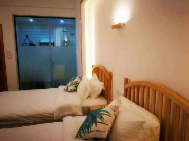 Imagen general del Hotel Shi Nian Inn. Foto 8