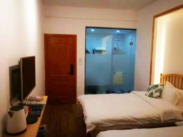 Imagen de la habitación del Hotel Shi Nian Inn. Foto 12