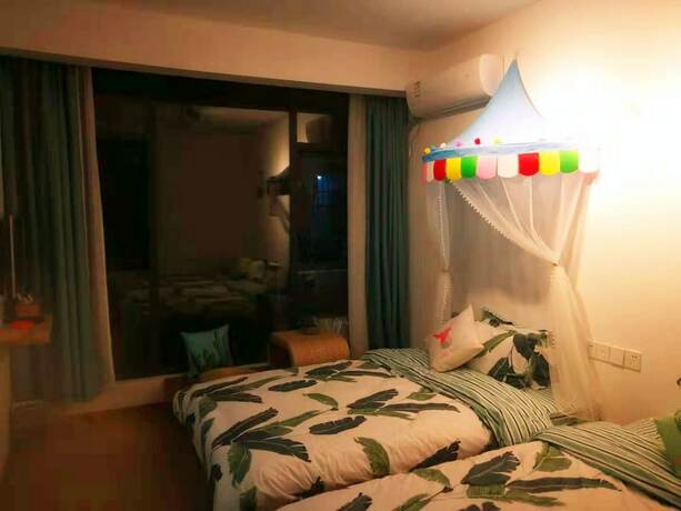 Imagen de la habitación del Hotel Shi Nian Inn. Foto 14