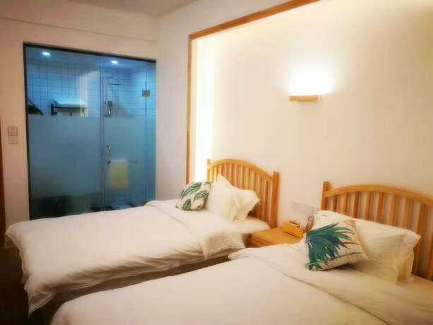 Imagen de la habitación del Hotel Shi Nian Inn. Foto 17