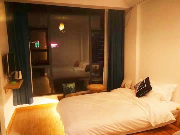 Imagen de la habitación del Hotel Shi Nian Inn. Foto 19