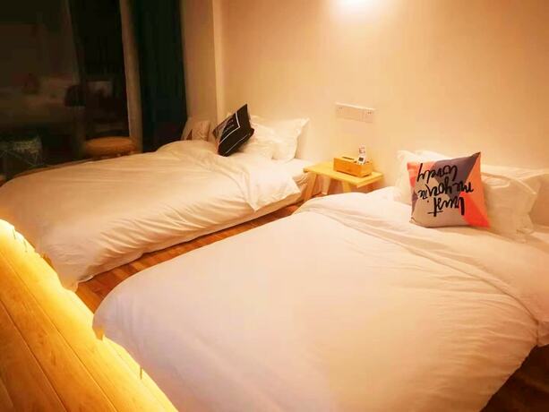 Imagen de la habitación del Hotel Shi Nian Inn. Foto 21