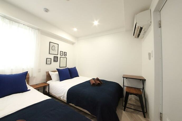 Imagen de la habitación del Hotel Shibuya Wave 401. Foto 18