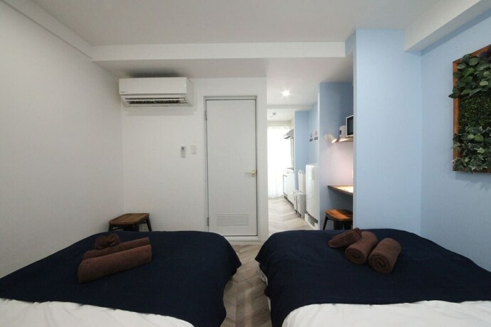 Imagen de la habitación del Hotel Shibuya Wave 401. Foto 22