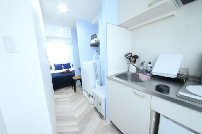 Imagen de la habitación del Hotel Shibuya Wave 402. Foto 19