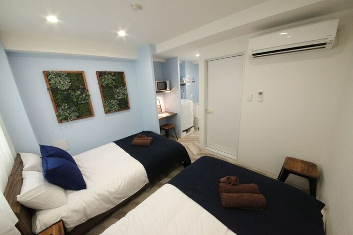 Imagen de la habitación del Hotel Shibuya Wave 402. Foto 23