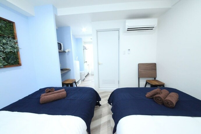 Imagen de la habitación del Hotel Shibuya Wave 402. Foto 35