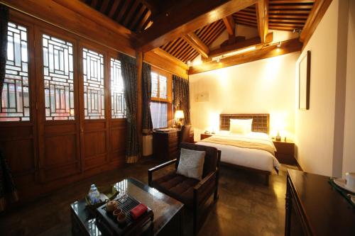 Imagen de la habitación del Hotel Shichahai Sandalwood Boutique Beijing. Foto 6
