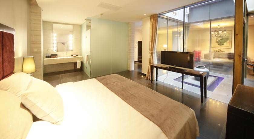 Imagen de la habitación del Hotel Shichahai Sandalwood Boutique Beijing. Foto 10