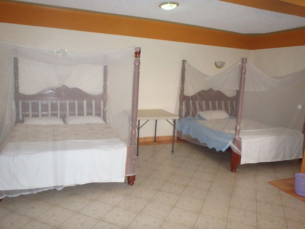 Imagen de la habitación del Hotel Shield Park Villa. Foto 8