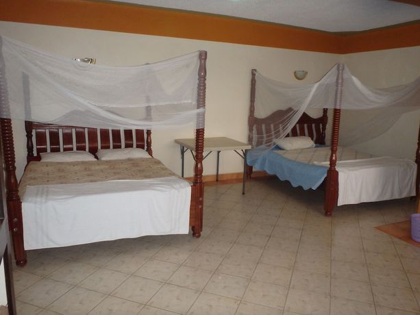 Imagen de la habitación del Hotel Shield Park Villa. Foto 10