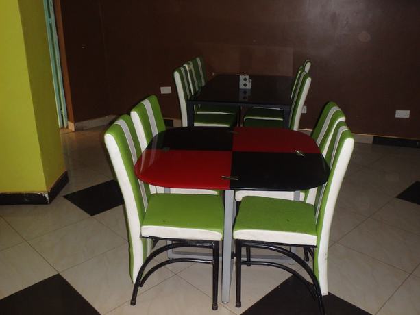 Imagen del bar/restaurante del Hotel Shield Park Villa. Foto 3