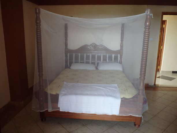 Imagen de la habitación del Hotel Shield Park Villa. Foto 16