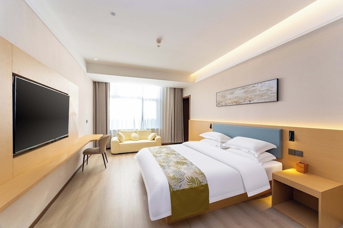 Imagen de la habitación del Hotel Shiershan Yuntang. Foto 2