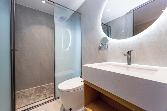 Imagen de la habitación del Hotel Shiershan Yuntang. Foto 9