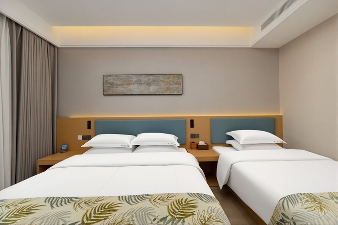 Imagen de la habitación del Hotel Shiershan Yuntang. Foto 10