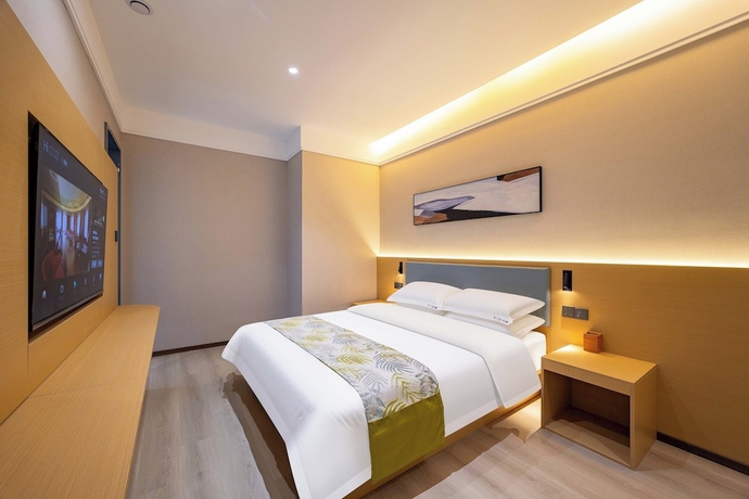 Imagen de la habitación del Hotel Shiershan Yuntang. Foto 11