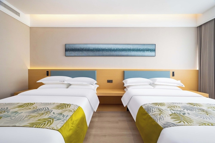 Imagen de la habitación del Hotel Shiershan Yuntang. Foto 12