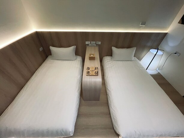 Imagen de la habitación del Hotel Shigang. Foto 19