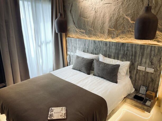 Imagen de la habitación del Hotel Shigang. Foto 20