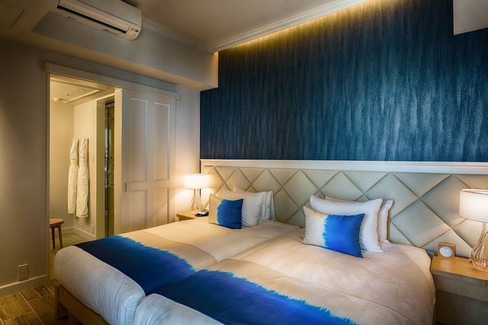 Imagen de la habitación del Hotel Shigira Mirage. Foto 16