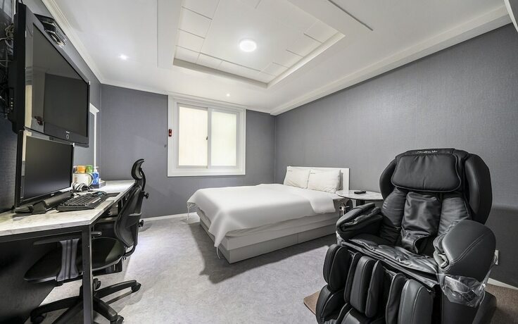 Imagen de la habitación del Hotel Shiheung New Rose. Foto 13