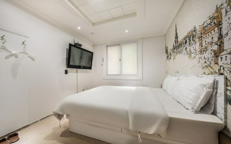 Imagen de la habitación del Hotel Shiheung New Rose. Foto 14