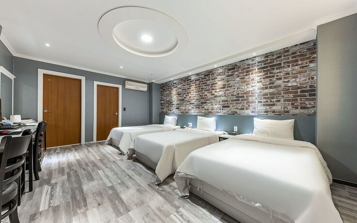 Imagen de la habitación del Hotel Shiheung New Rose. Foto 15