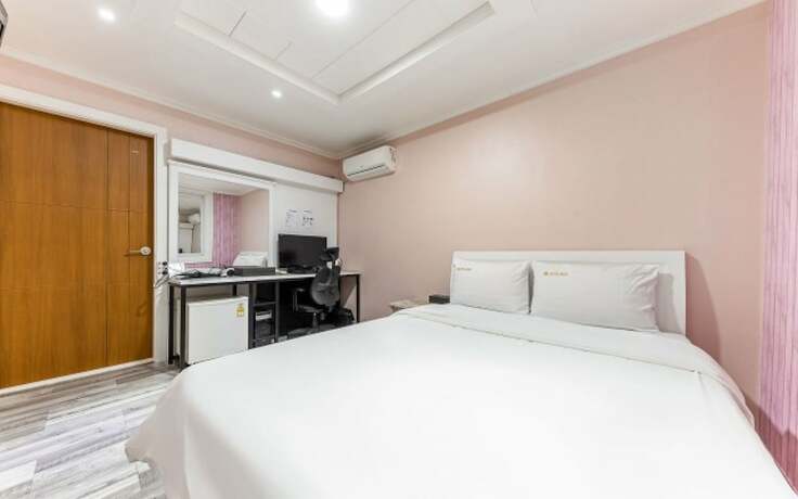Imagen de la habitación del Hotel Shiheung New Rose. Foto 16